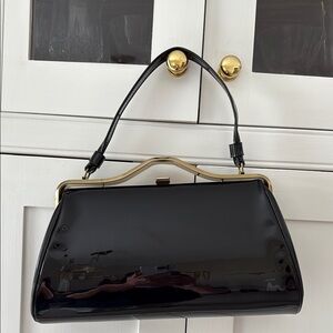Elegant Black Handbag. Perfect for the Holiday season.